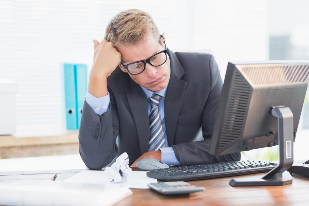 Picture showing a man stress about payroll solutions